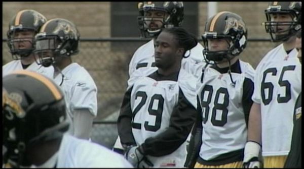 Chevon Walker (centre) at Ticats training camp, June 6, 2013