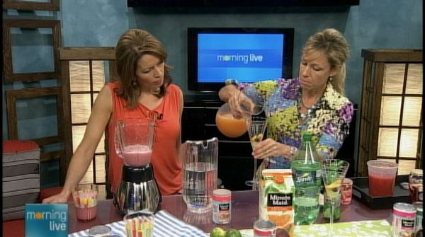 Nadine Hughes pours a cocktail as Lesley Stewart looks on, Morning Live, June 14, 2013