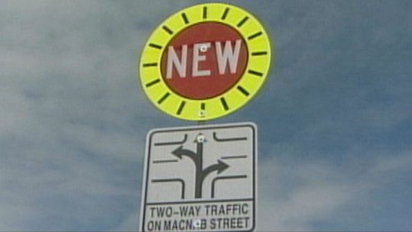 Sign indicating MacNab St N now two-way between Cannon and Burlington Sts in Hamilton, June 18, 2013