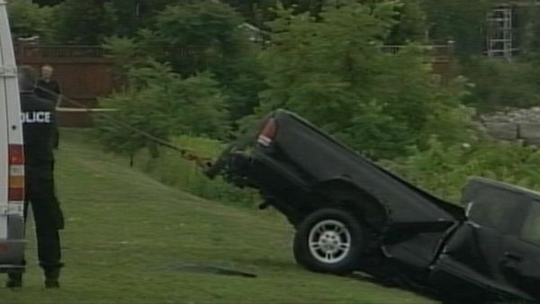 A truck is recovered from Lake Ontario after a man is killed plunging in to the water; August 12, 2013