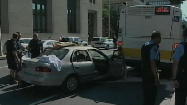 Car drives into back of HSR bus; Main & John Sts, Hamilton, August 16, 2013