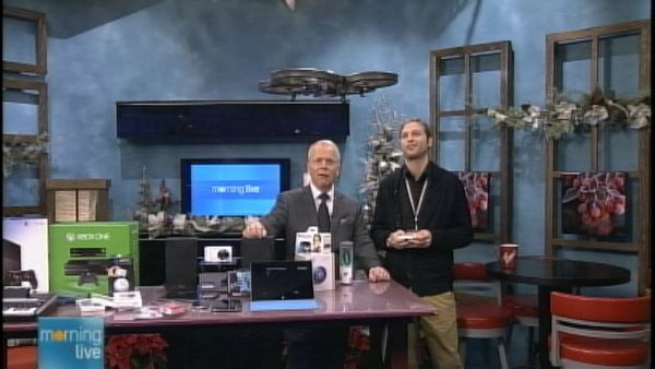 Bob Cowan and Future Shop's Neil McMillan test out a drone; Morning Live, December 10, 2013