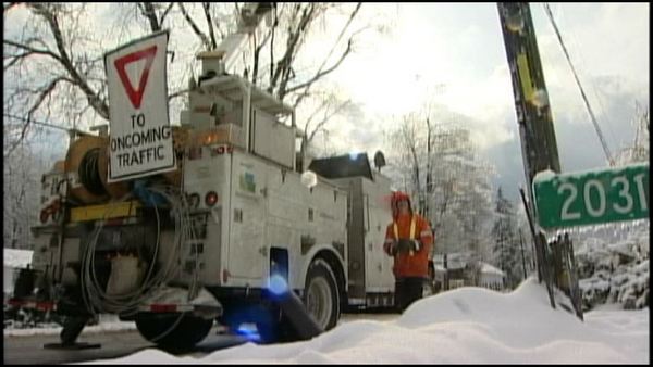 A hydro crew works on restoring service in Kilbride; December 26, 2013