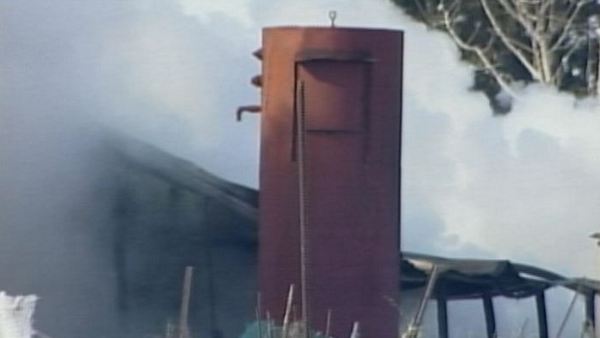 A fire ravages a storage barn at a Glanbrook farm; February 12, 2014