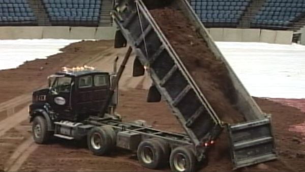 Truck dumps dirt on floor of FirstOntario Centre; Hamilton, April 2, 2014