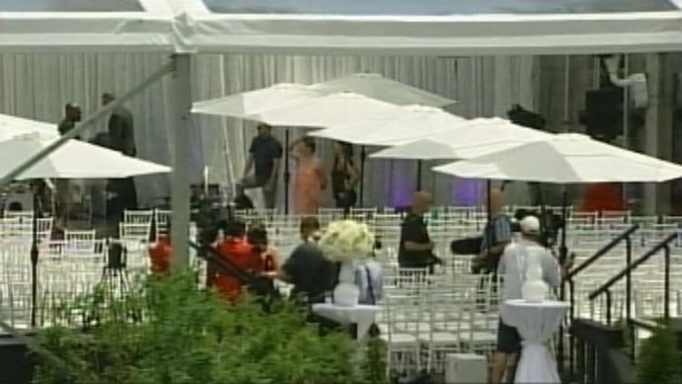 Preparing for a mass same-sex wedding at Casa Loma, Toronto, June 26, 2014