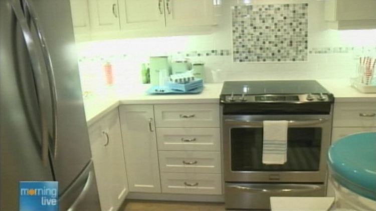 A kitchen in a home at South Coast Village by Marz Homes; Morning Live, August 8, 2014