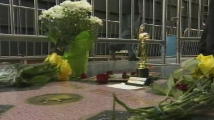 Floral tributes left on Robin Williams' star on the Hollywood Walk of Fame; August 12, 2014