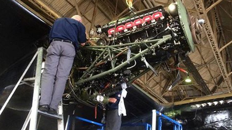 Repairs being done on a Lancaster engine (handout)