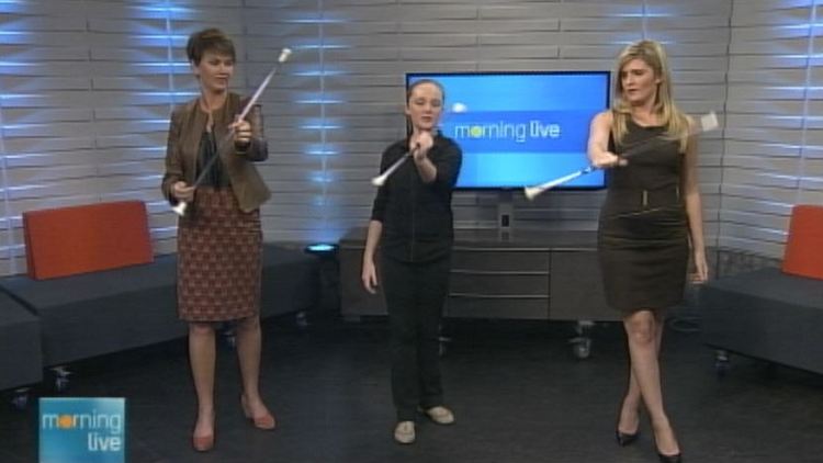 Annette Hamm and Jaclyn Colville get schooled in baton twirling by Sarah Doherty; Morning Live, September 16, 2014