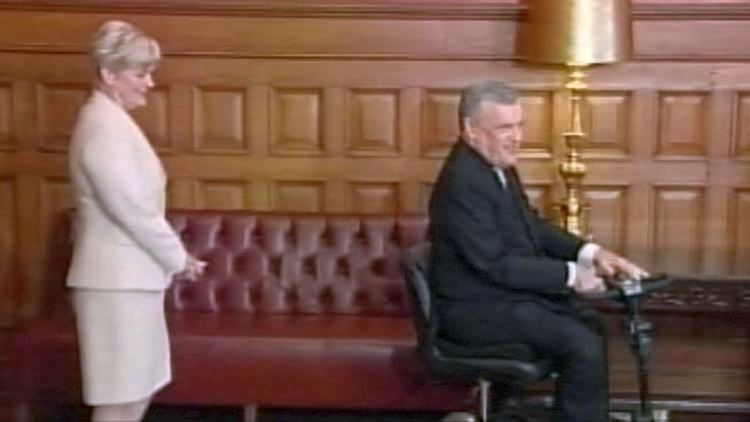 Ruth Ann Onley follows her husband, Lieutenant-Governor David Onley, into a media conference; Queen's Park, September 22, 2014