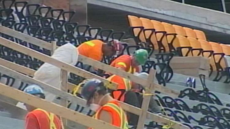 Workers at the Hamilton Pan Am stadium (file)