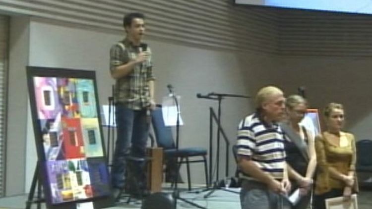 Tyler Sullivan King addresses attendees of an addiction recovery breakfast; Hamilton, September 24, 2014