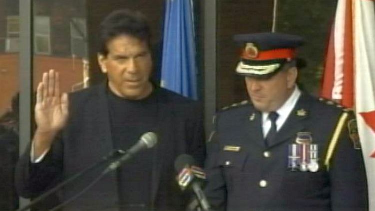 Lou Ferrigno being sworn in as a honourary Hamilton Police constable by chief Glenn De Caire; October 3, 2014