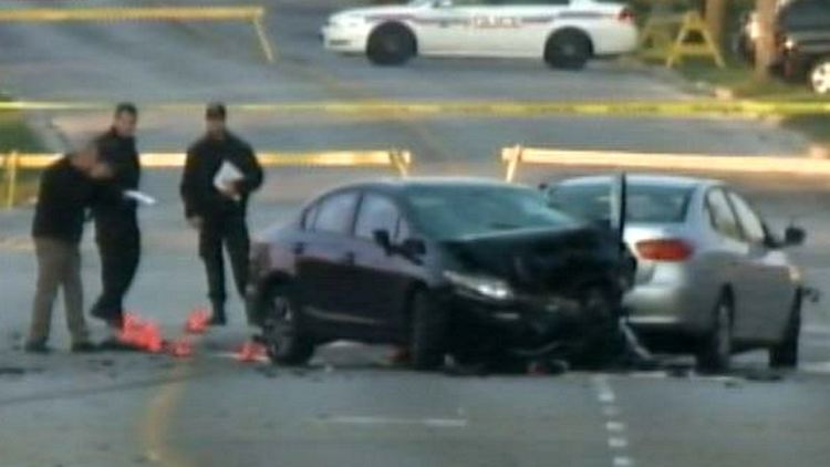 Officers investigate a head on collision at Niagara and Lakeshore, St Catharines, October 3, 2014