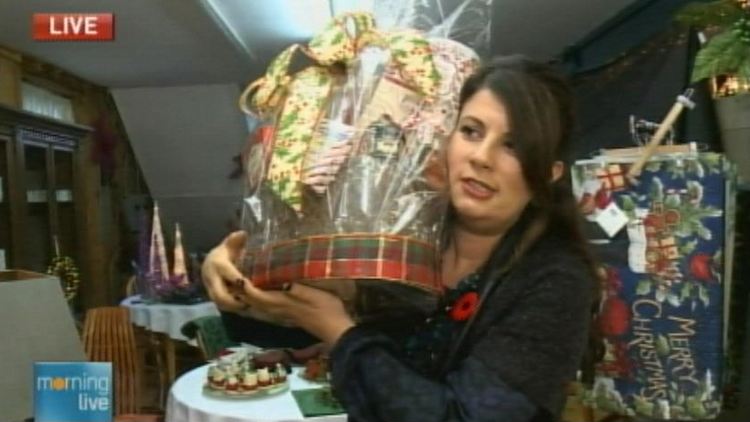 Lori DeAngelis with a Christmas basket at Dutch Mill Country Market; Morning Live, November 5, 2014