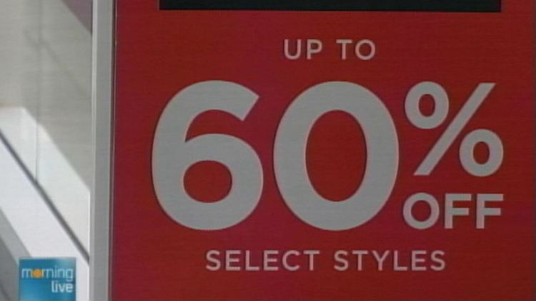 A 60 per cent off sign in a store window (archives)