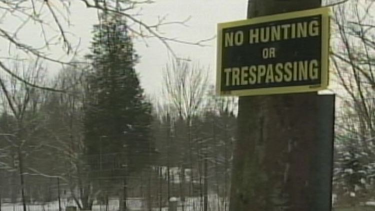 A 'no hunting or trespassing' sign outside Short Hills Provincial Park; Thorold