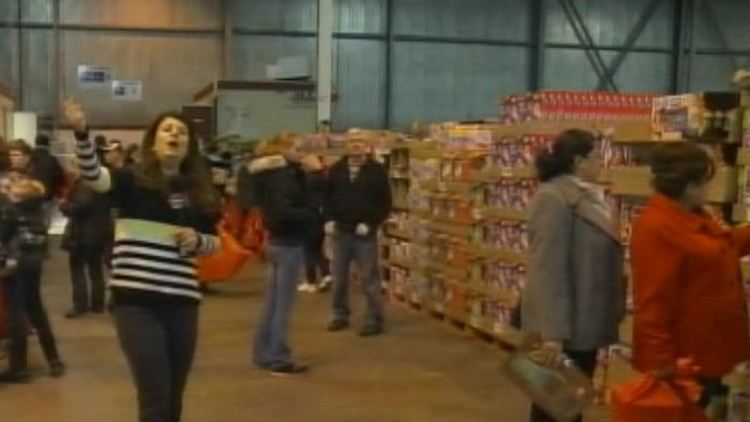 Lori DeAngelis at the Samko warehouse toy sale; Morning Live, November 27, 2014