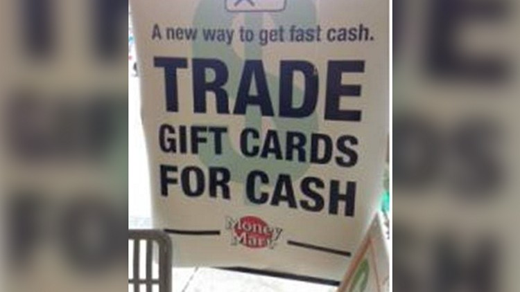 'Trade gift cards for cash' sign at Money Mart