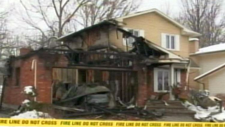 Damage at home of former NHL player Paul Bissonnette's parents; Welland, December 12, 2014