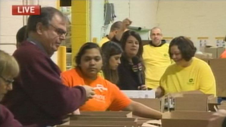 Lori DeAngelis (centre) at Hamilton Food Share; Morning Live, December 15, 2014