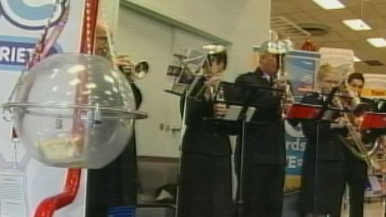 Archive image of a Salvation Army kettle and band