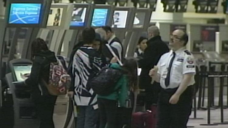 Travellers at Pearson Airport; Mississauga, December 17, 2014