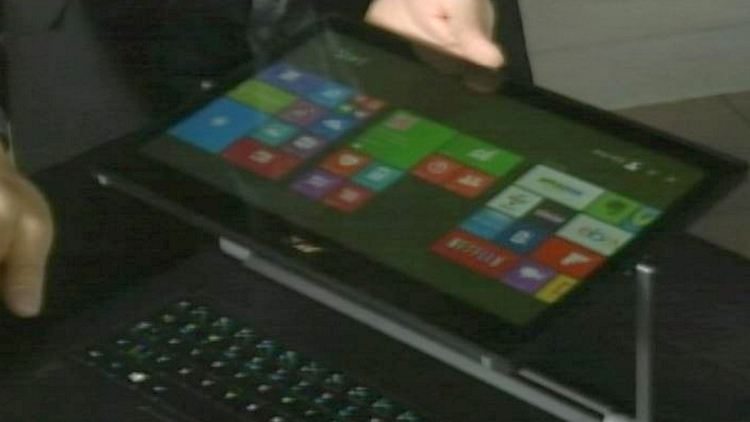 Marc Salzman demonstrates a convertible laptop/tablet; Morning Live, January 7, 2015