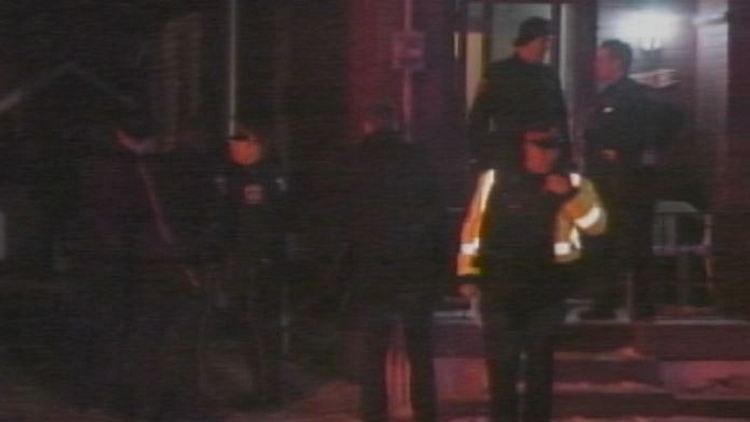 Police outside home where man was shot dead; Hamilton, January 9, 2015