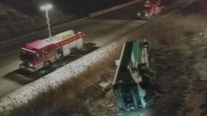 A fire truck lights the scene of a GO bus crash; Vaughan, January 15, 2015