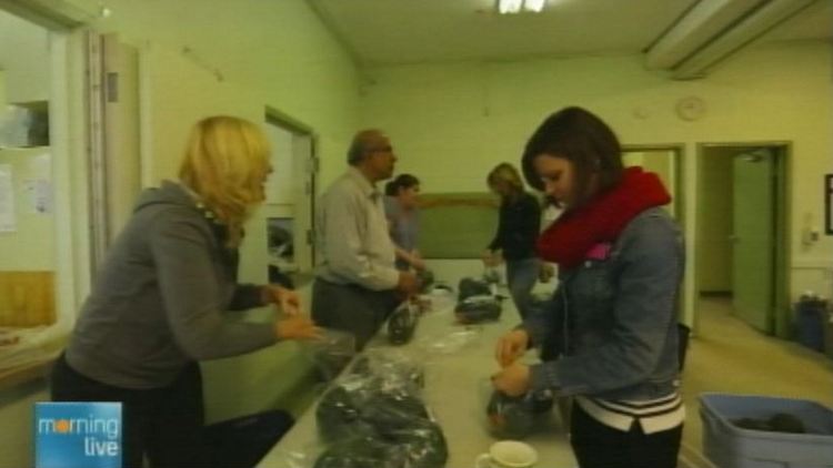 Burgeonvest Bick Securities employees volunteering; Morning Live, January 20, 2015