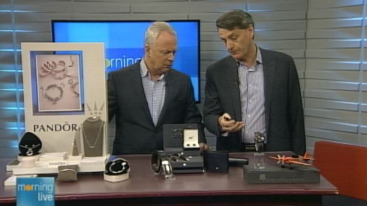 Bob Cowan and Ross Ashley peruse a pen; Morning Live, February 6, 2015