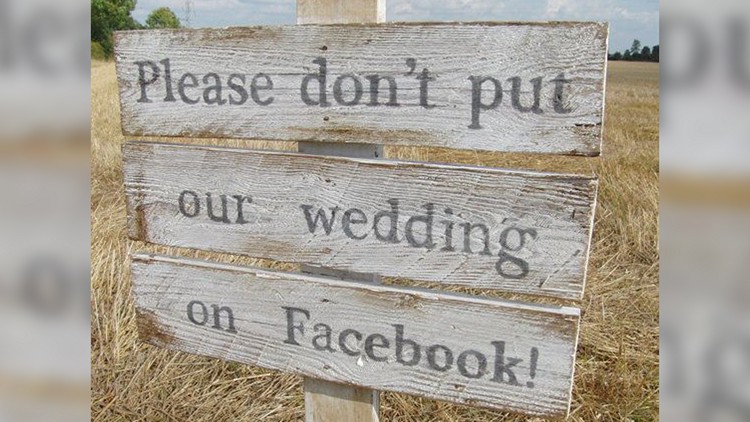 Sign says 'Please don't post our wedding on Facebook'