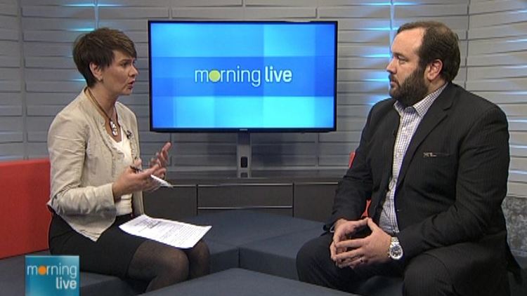 Annette Hamm and Momentum Credit Union CEO Malcolm Stoffman; Morning Live, March 18, 2015