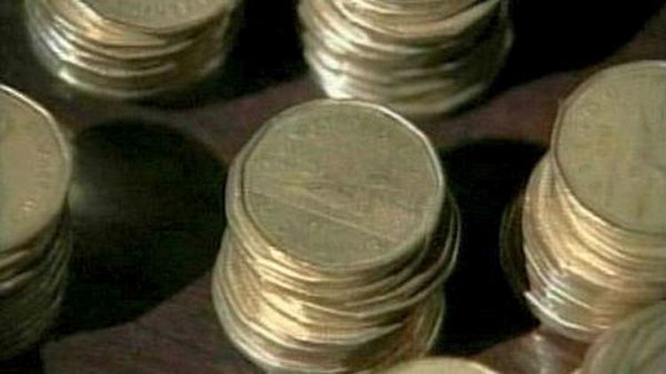 Stacks of Loonies (Canadian dollar coins)