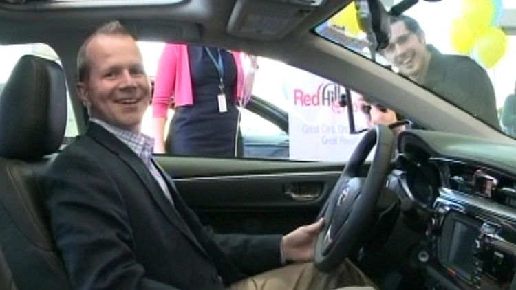 Chris Taylor of Waterdown behind the wheel of his new Toyota Corolla S; Hamilton, May 7, 2015