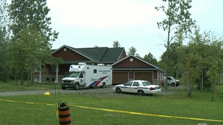 Toronto Police vehicles outside a Wainfleet residence; July 17, 2015