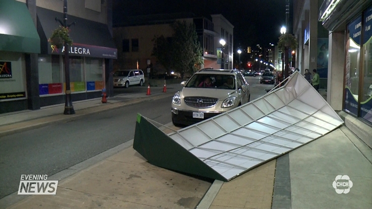 High winds brought down an awning in Hamilton on Friday night