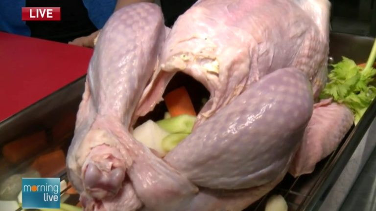 A turkey in the process of getting stuffed; Morning Live, October 8, 2015