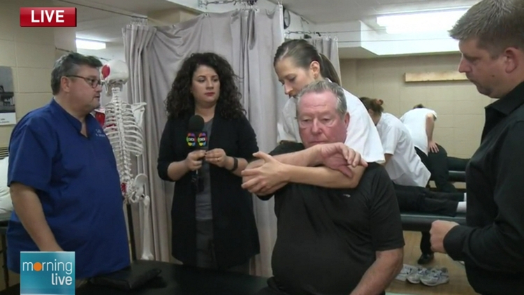 Robert Johnson, Lori DeAngelis with doctors and patients at Hamilton's Canadian Academy of Osteopathy; Morning Live, October 27, 2015