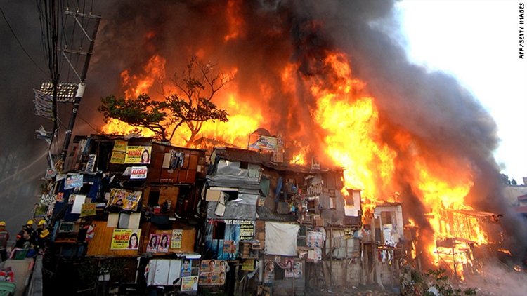 A pre-dawn fire in the southern Philippines raced through public market stalls, killing 15 vendors, including six children.