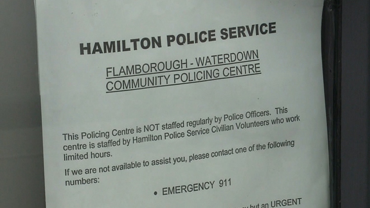 A sign posted on the door of the Flamborough community policing station in Waterdown; November 10, 2015