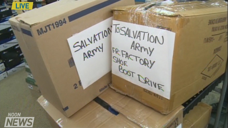 Boxes of donations to Factory Shoe boot drive; Noon News, November 26, 2015