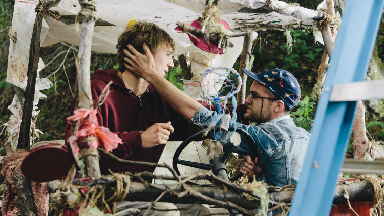 Paul Dano and Daniel Scheinert on the set of SWISS ARMY MAN. Photo by Joyce Kim, courtesy of A24.