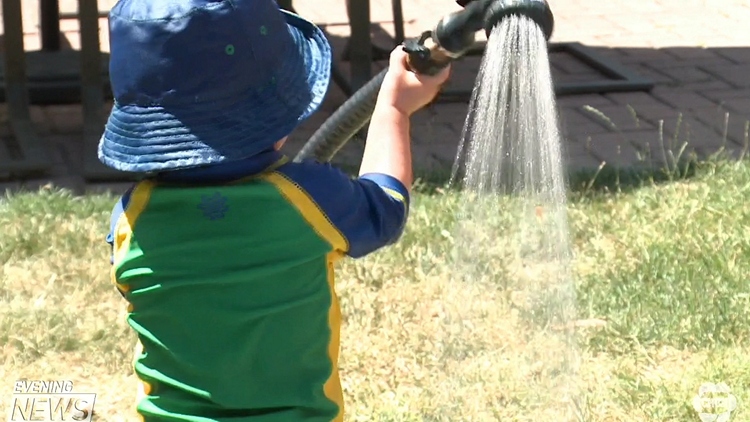 Dangers of using a garden hose in the heat