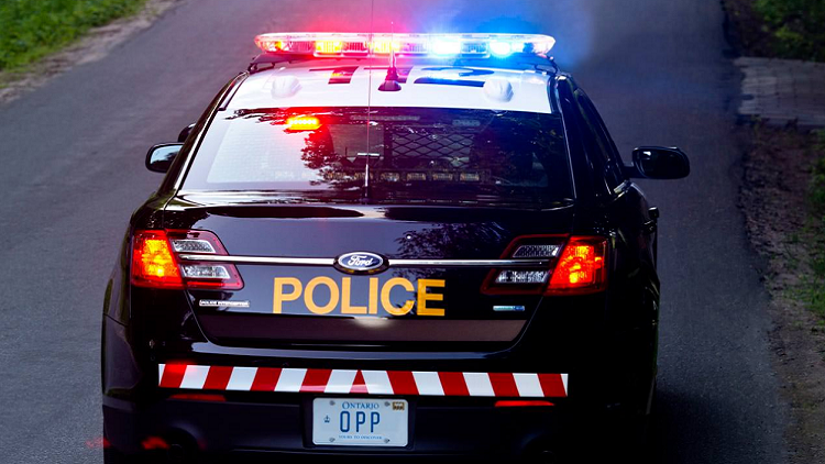 OPP charge driver going 200 km/h on the QEW