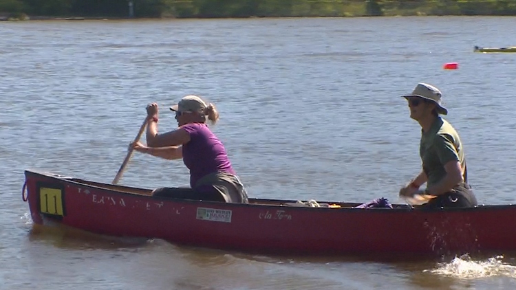 Paddlers take out their canoes for Paddle the Point