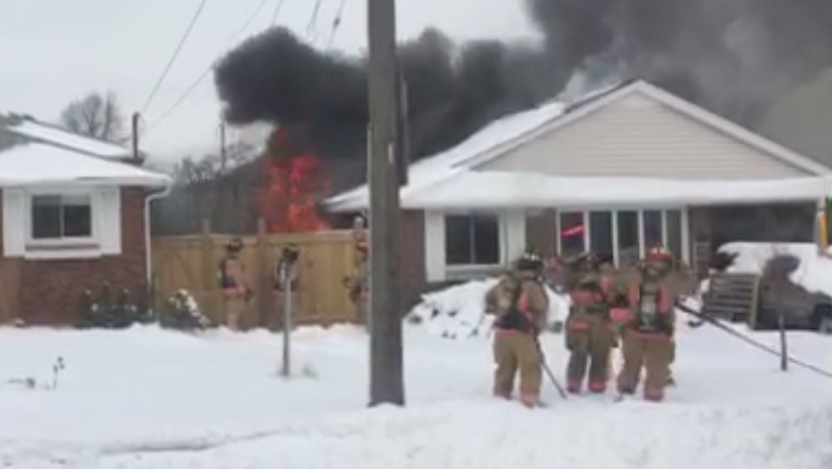 Crews battle house fire on Hamilton Mountain