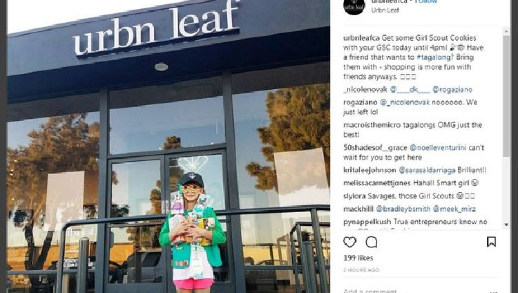 Girl scout sells cookies outside San Diego weed shop